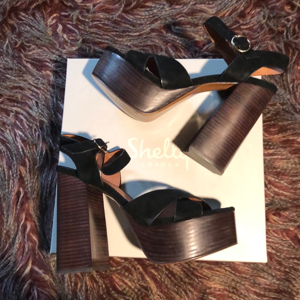 Shelly’s London black platforms 8.5